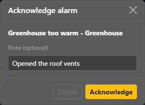 The Acknowledge alarm window with the alarm's text and a note typed in