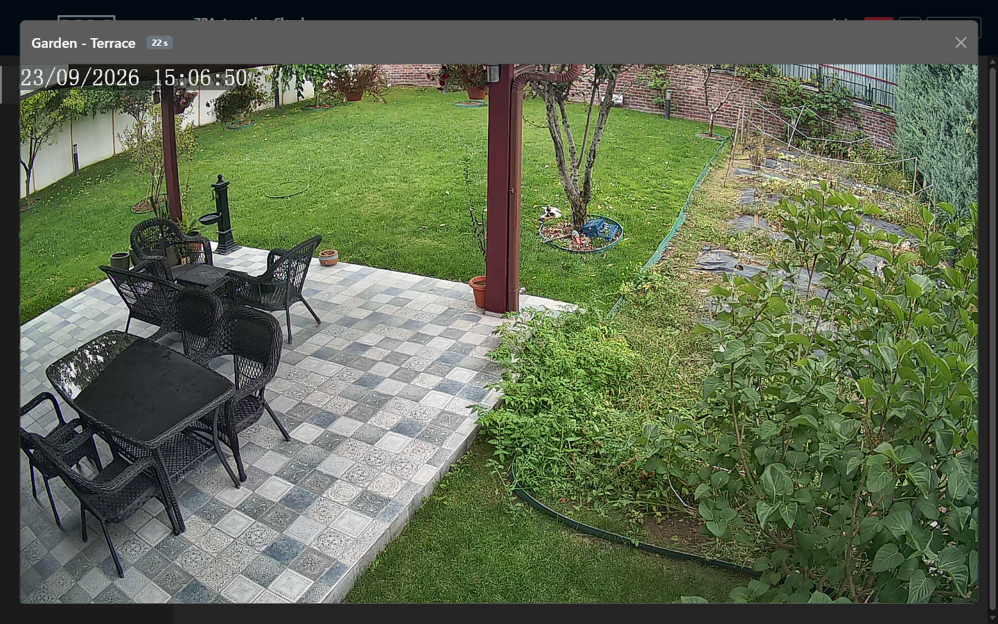 A camera window over the dashboard showing a garden picture and the seconds left